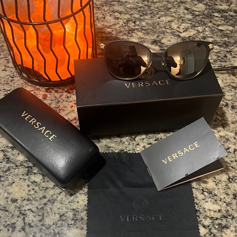 Versace sunglasses . No scratches